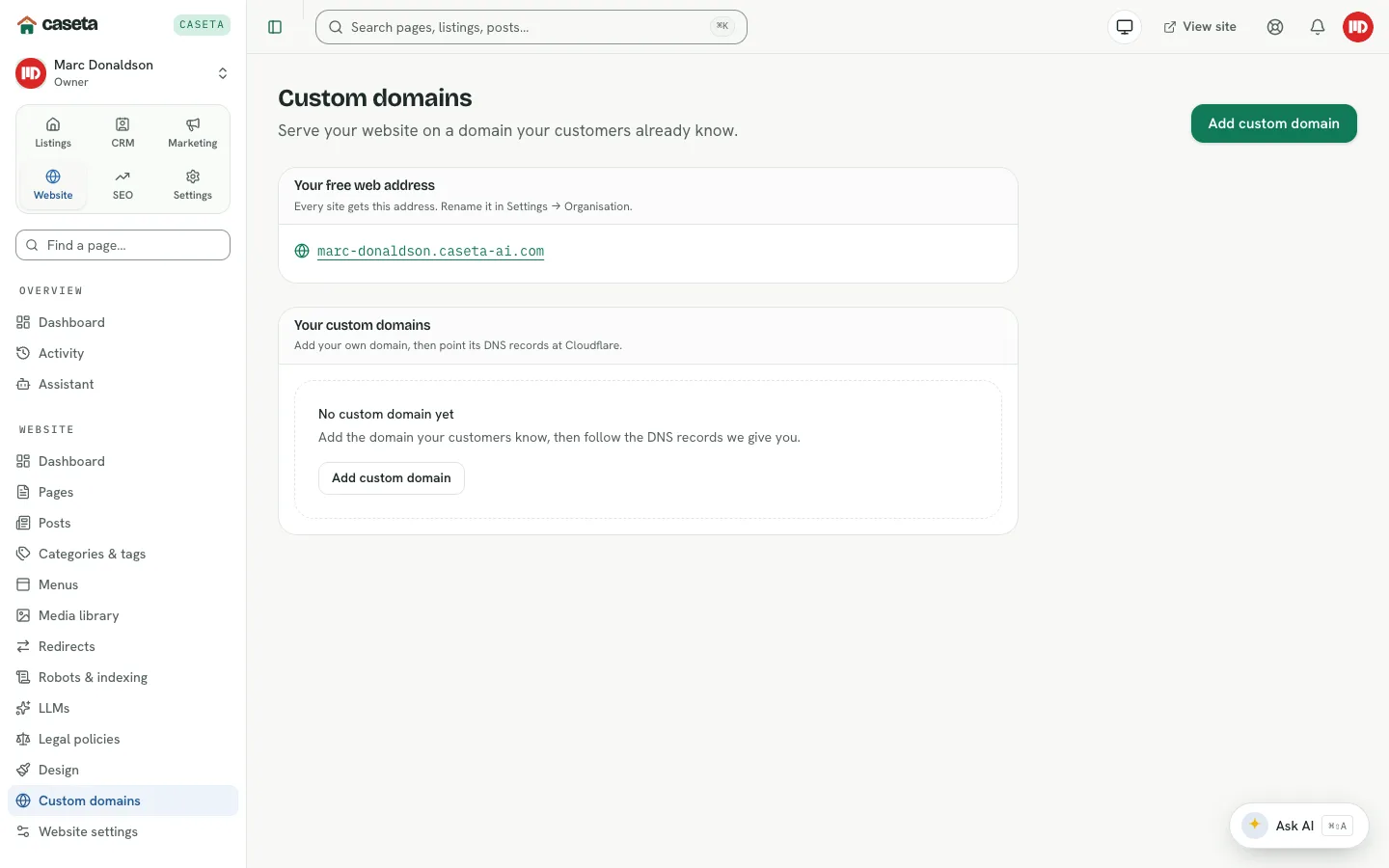 Custom domains page with the free address and add domain action